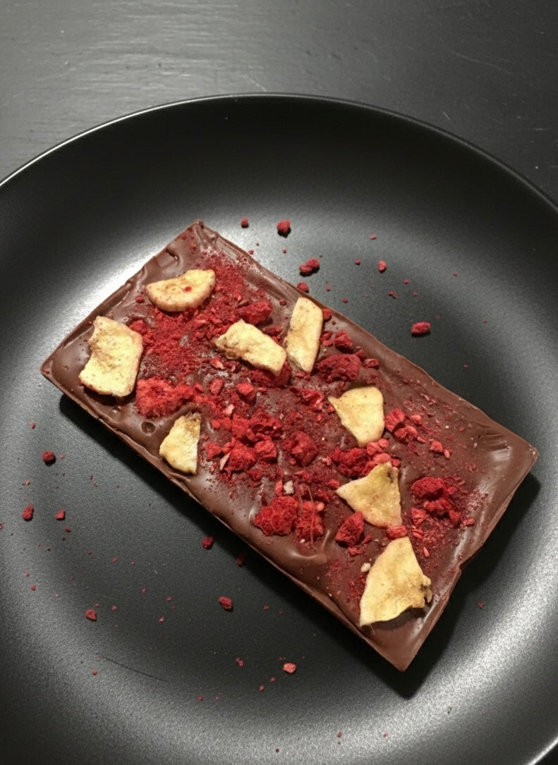Belgian Milk Chocolate with Dry Raspberry and Banana– 100g
